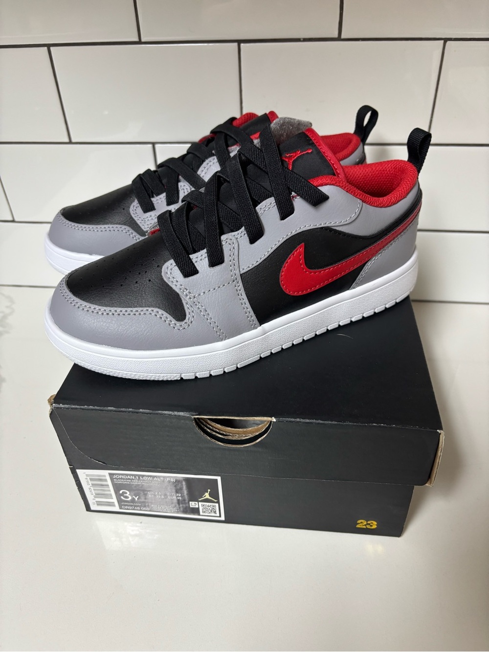 Air Jordan 1 Low Cement Fire Red Size 3Y Youth